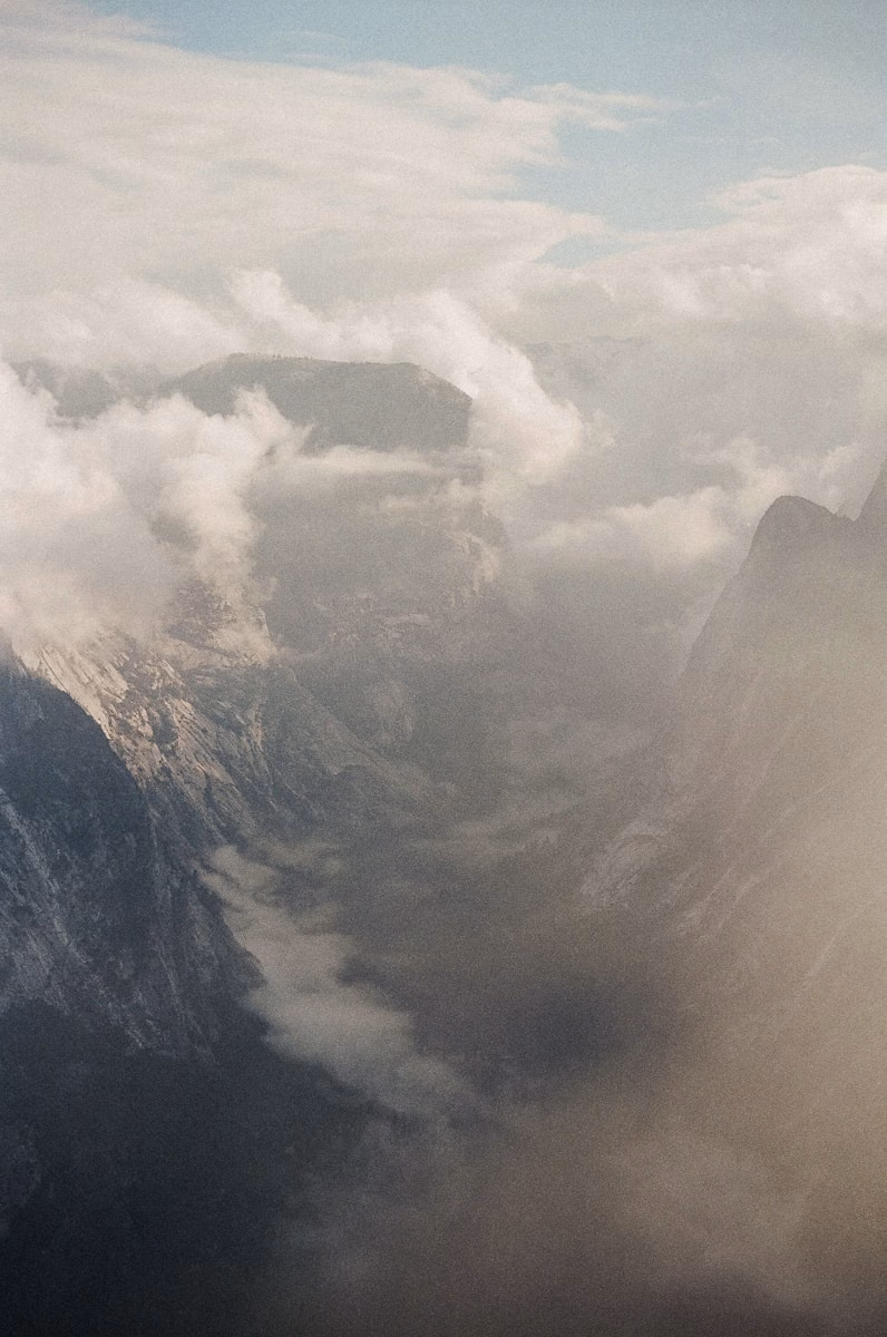 Misty mountain peaks shrouded in clouds